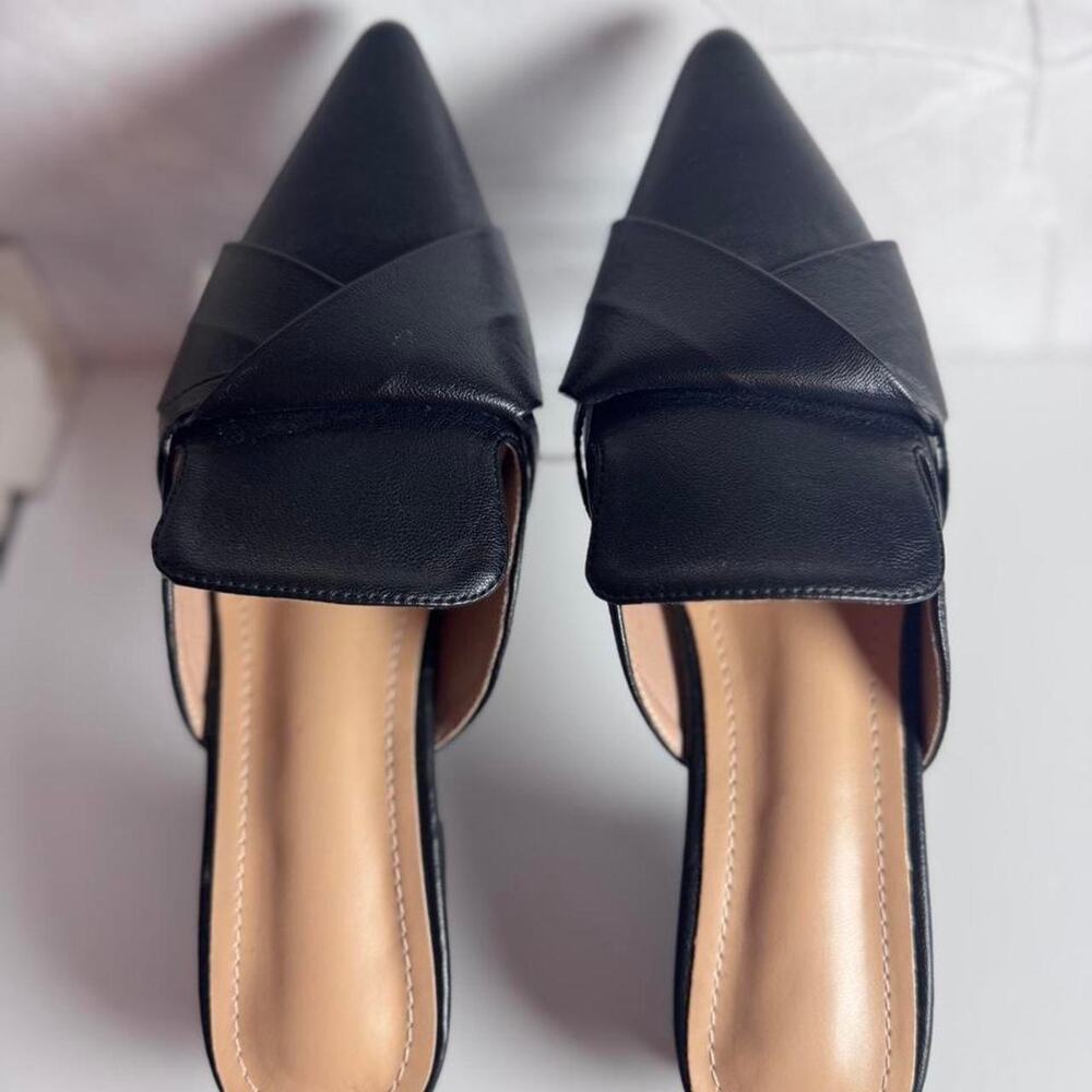 Black leather pointed toe mules